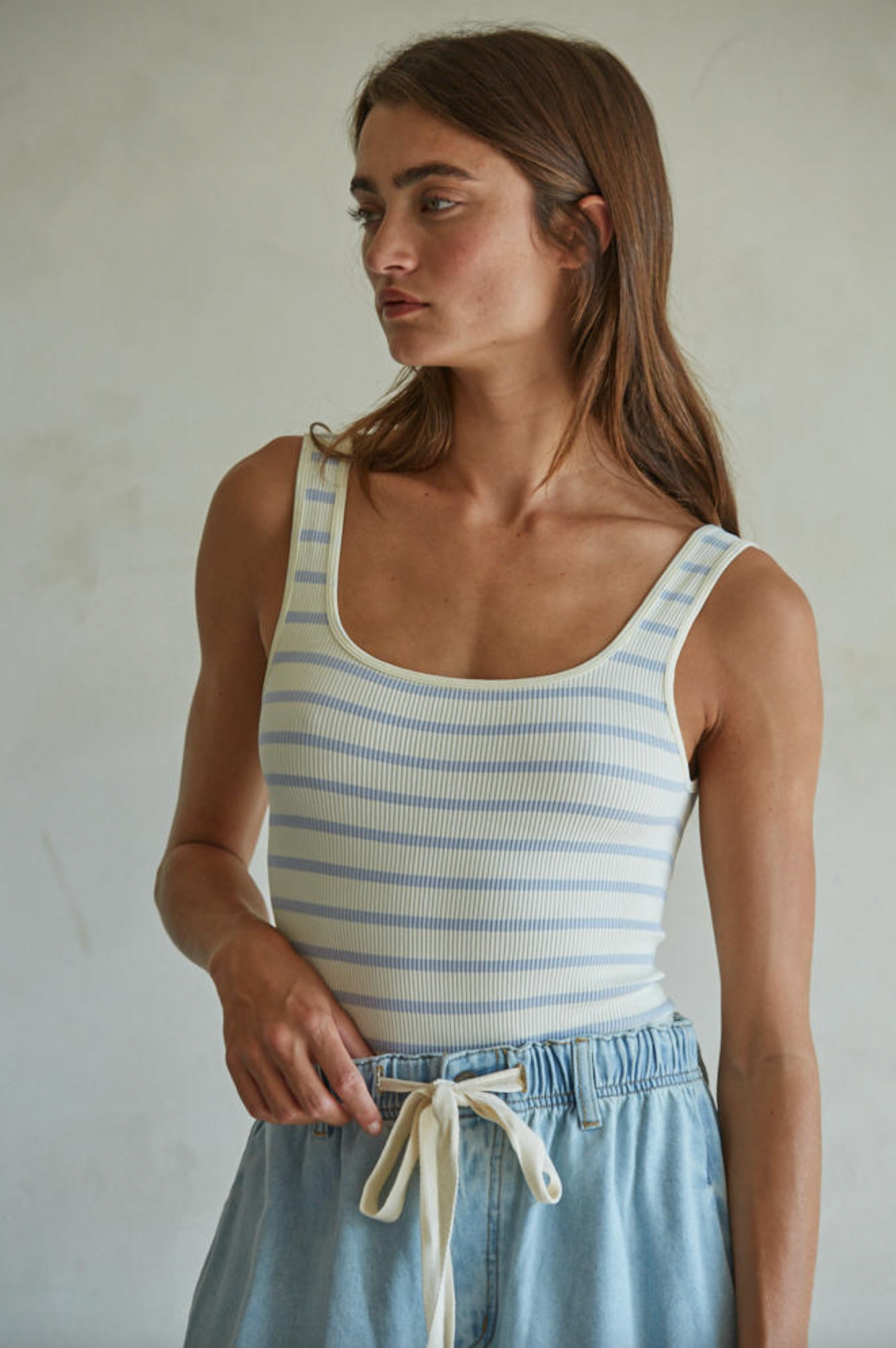 STRIPPED RIBBED BODYSUIT